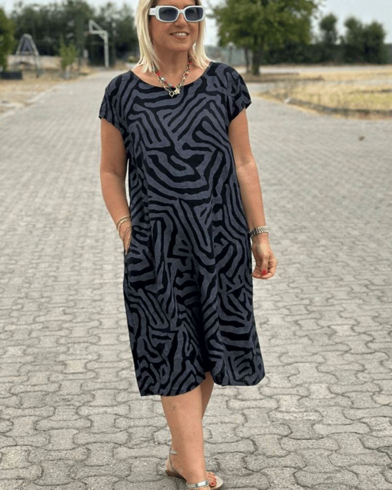 Nelia™ – Luchtige Zomerjurk met Elegante Print
