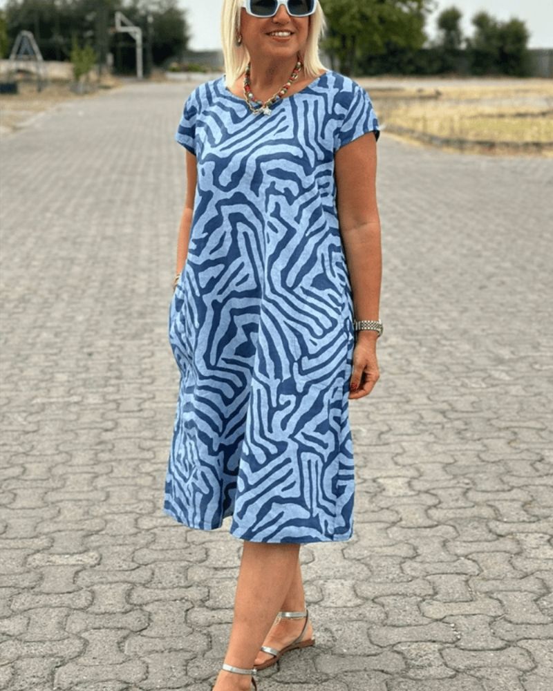 Nelia™ – Luchtige Zomerjurk met Elegante Print